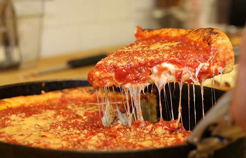 Chicago Style Deep Dish Pizza In Bartolis Pizzeria Tasteatlas