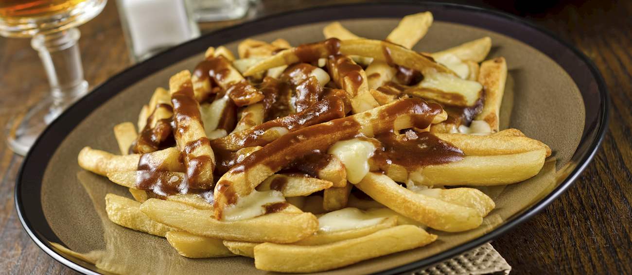 Poutine Traditional Potato Dish From Quebec, Canada TasteAtlas