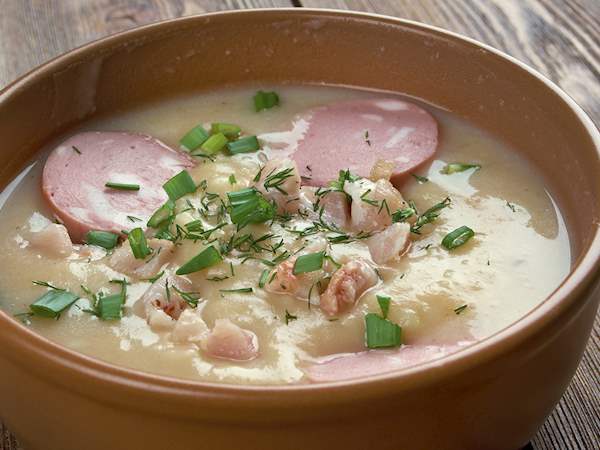 German traditional KARTOFFELSUPPE potato and sausage soup on whi #2 Coffee  Mug by JM Travel Photography - Pixels