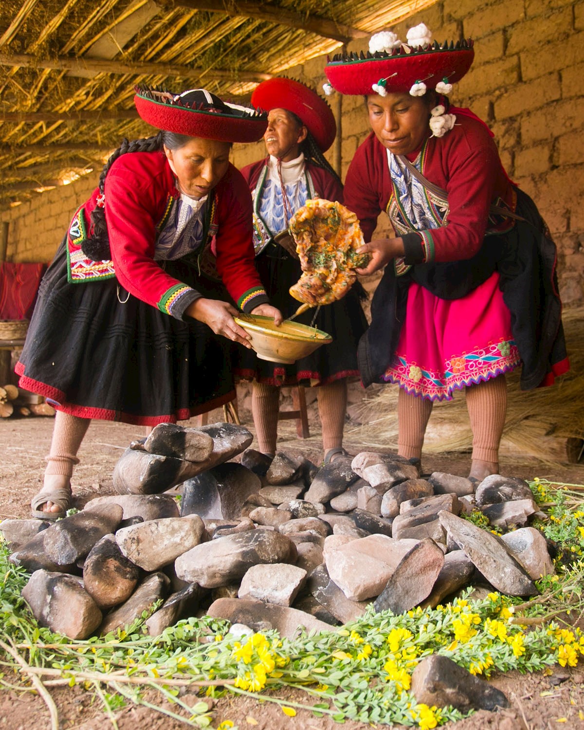 Local women preparing pachamanca feast - 