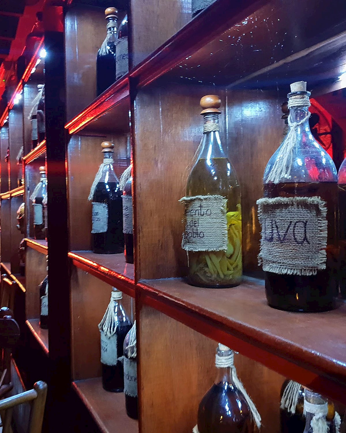 Local liquers on display in a bar in Iquitos - 