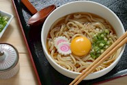 Tsukimi Udon Traditional Noodle Dish From Japan