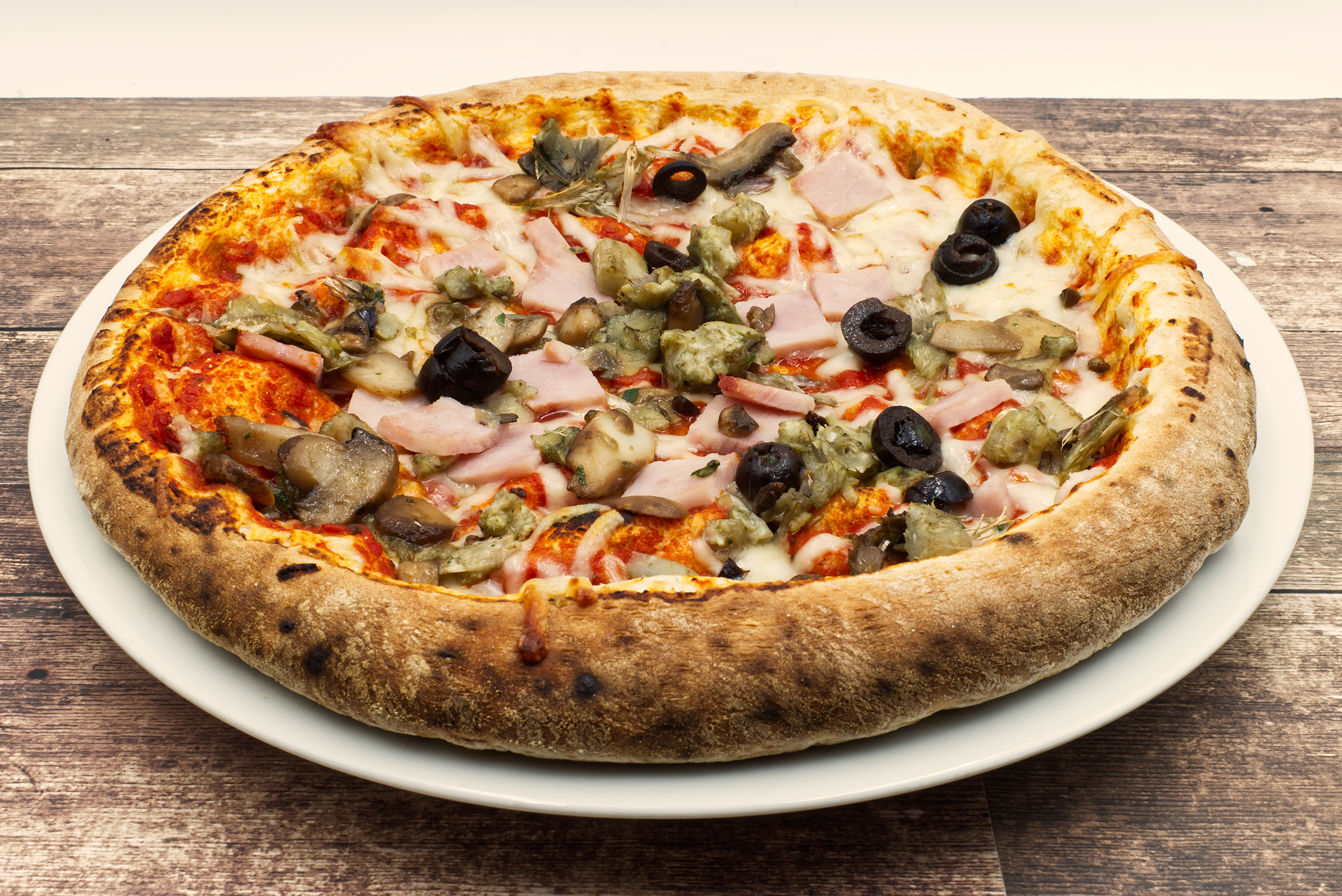 Mindre end Geologi Berettigelse Pizza Capricciosa Authentic Recipe | TasteAtlas