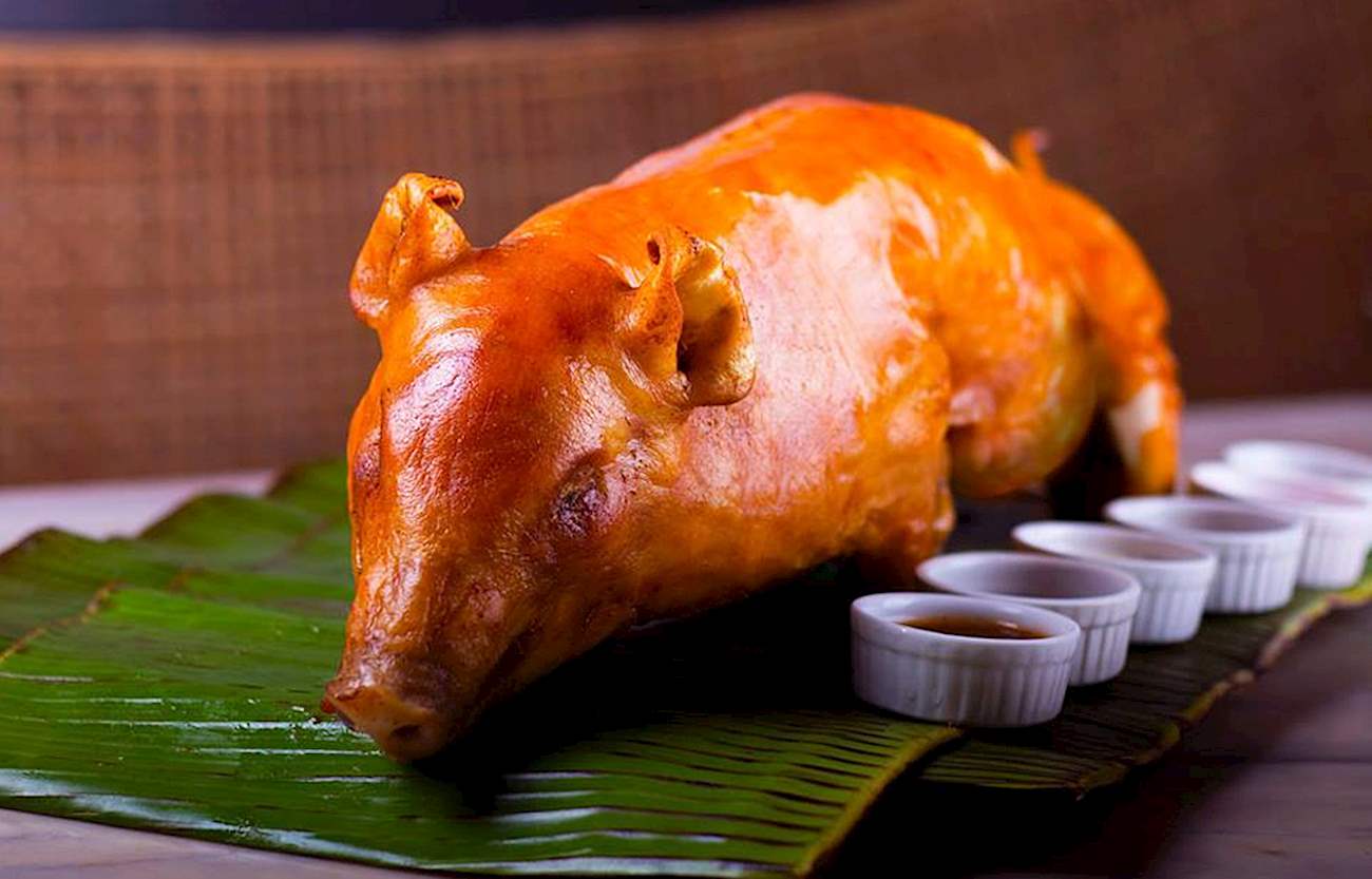 Lechon In Mesa Filipino Moderne | TasteAtlas | Recommended authentic