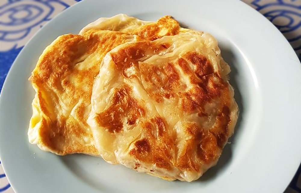 Roti Canai In Roti Canai TokBak | TasteAtlas | Recommended authentic ...