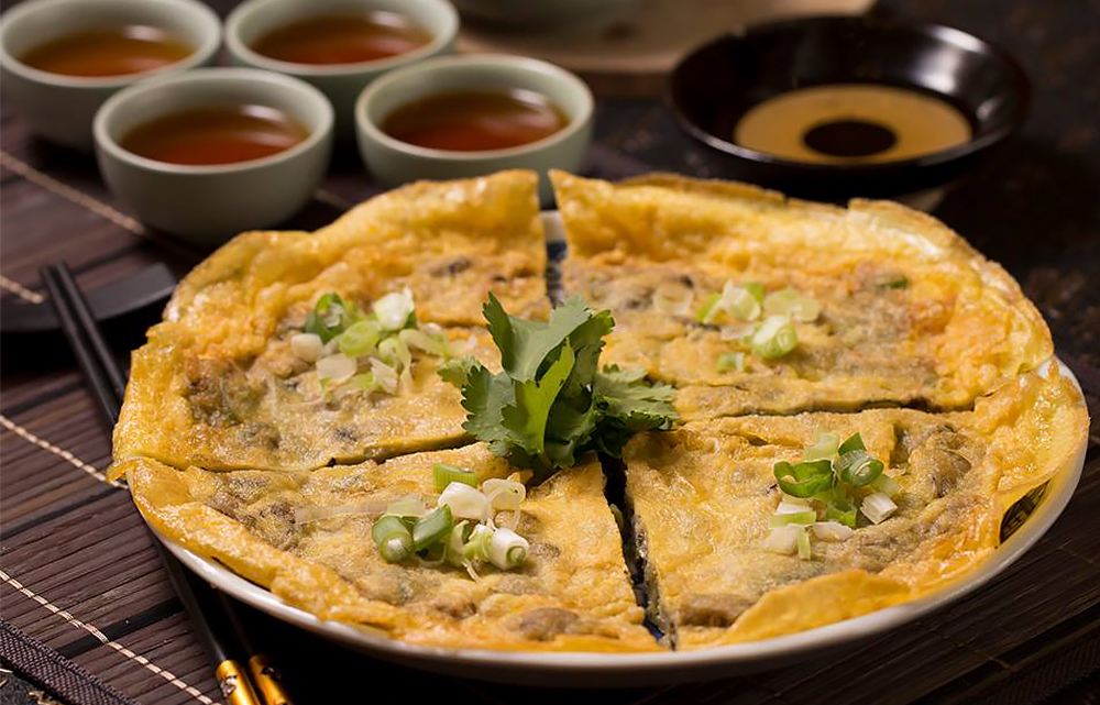 Oyster Omelet | Traditional Egg-based Dish From Fujian, China | TasteAtlas