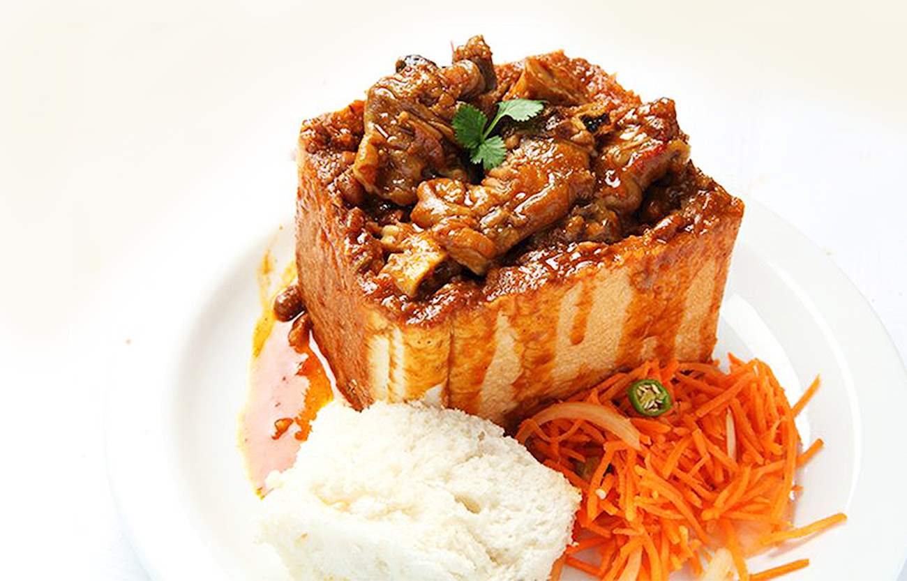 Bunny Chow In Capscium Restaurant | TasteAtlas | Recommended authentic