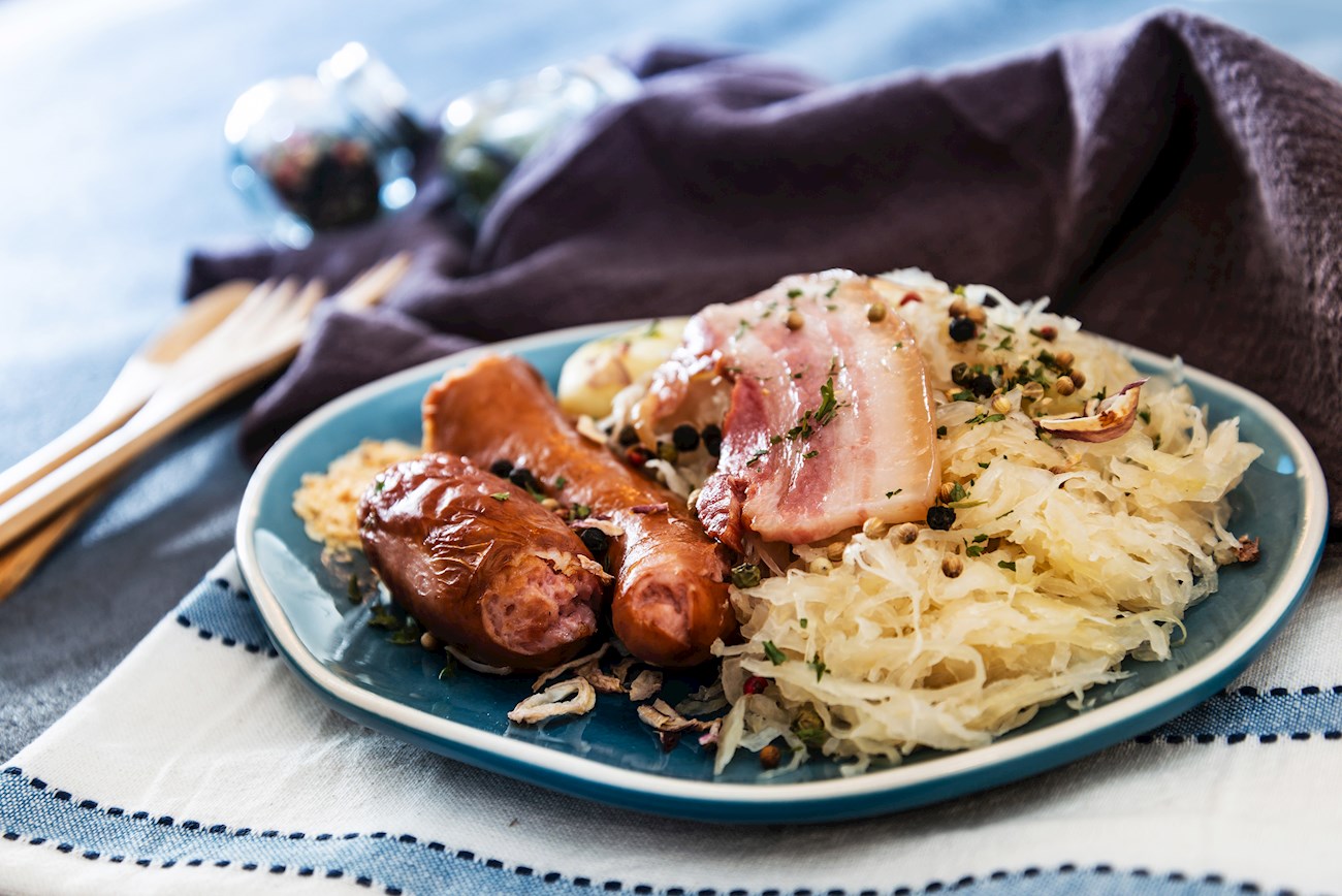 Sauerkraut With Sausages And Bacon Authentic Recipe TasteAtlas